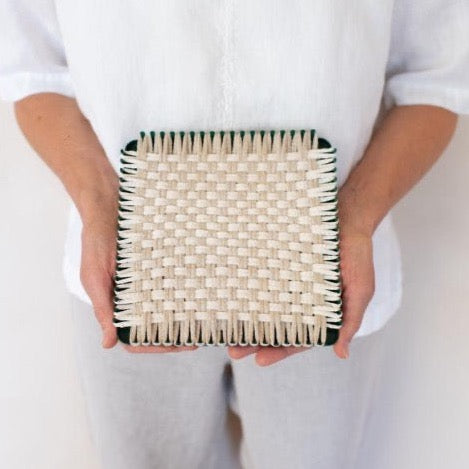 handmade 100 percent cotton woven potholder or trivet on the loom