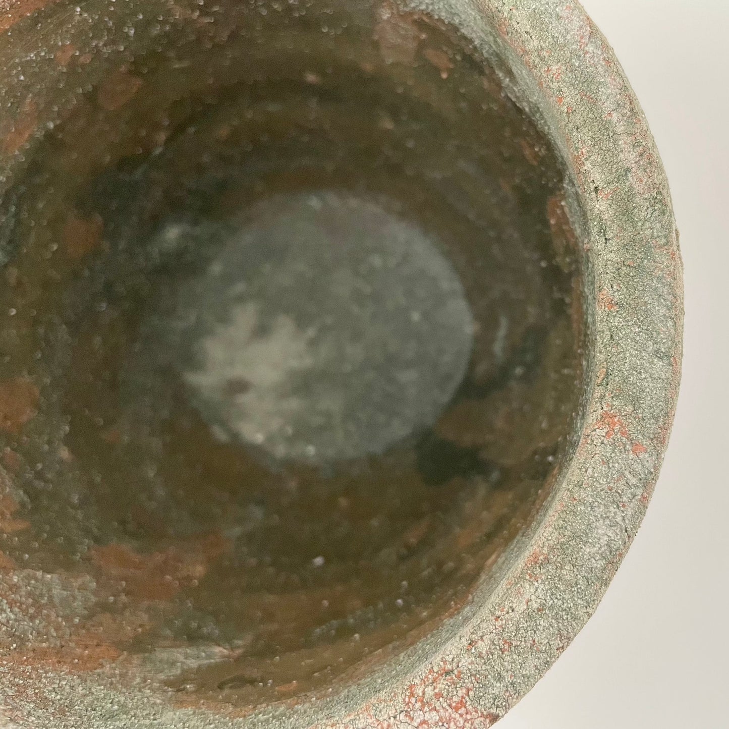 cement and ombre brick red round garden pot indoor planter