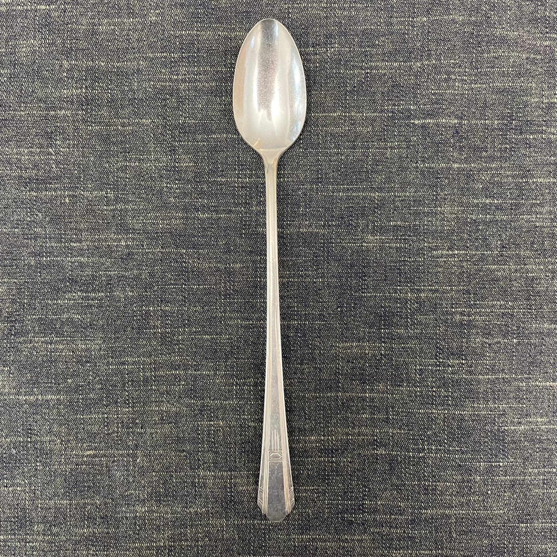 antique silver long handled teaspoon for serving jam or prop photography