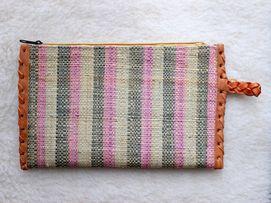 pink, green, and cream muted striped raffia woven zippered clutch with leather trim bohemian