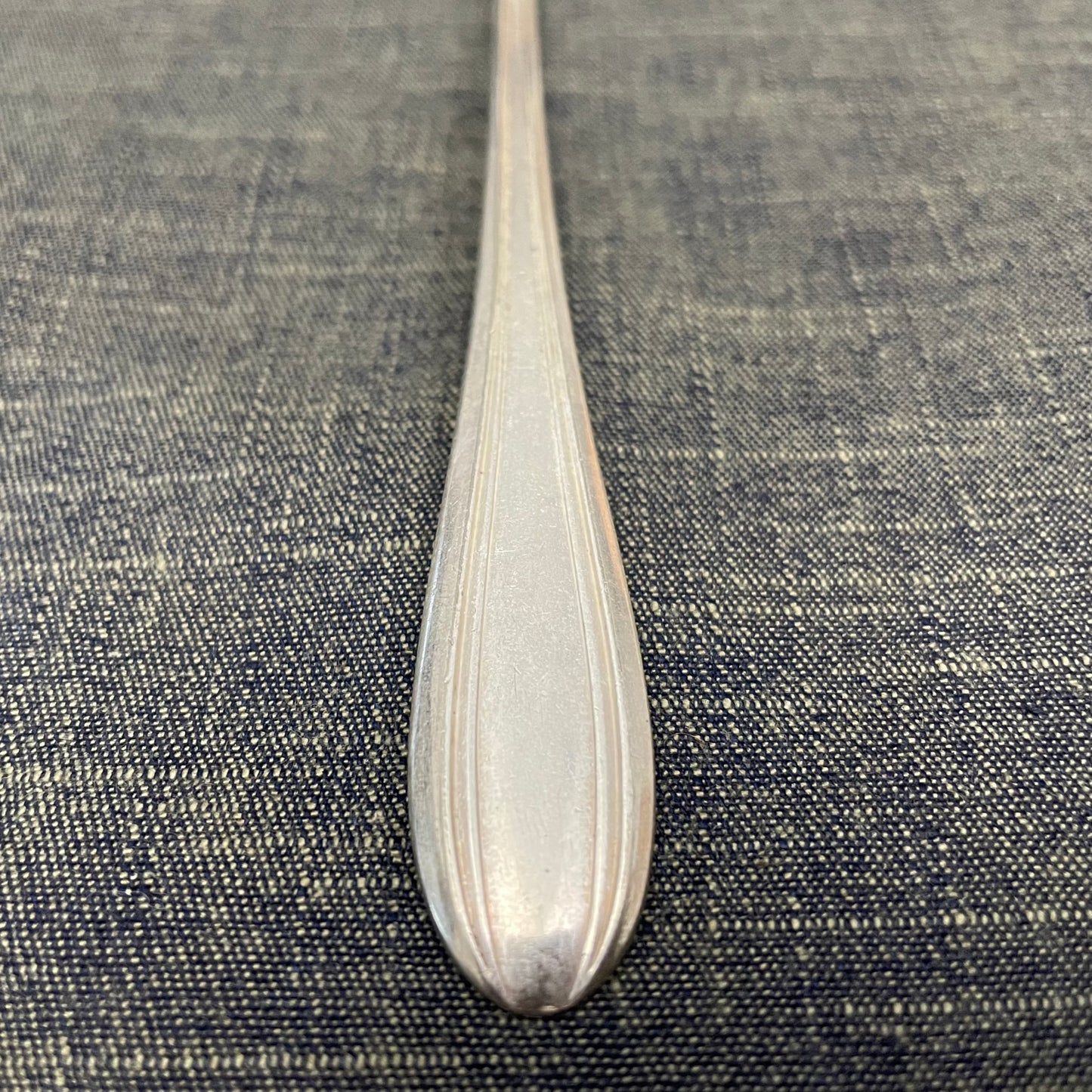 antique silver long handled teaspoon for serving jam or prop photography