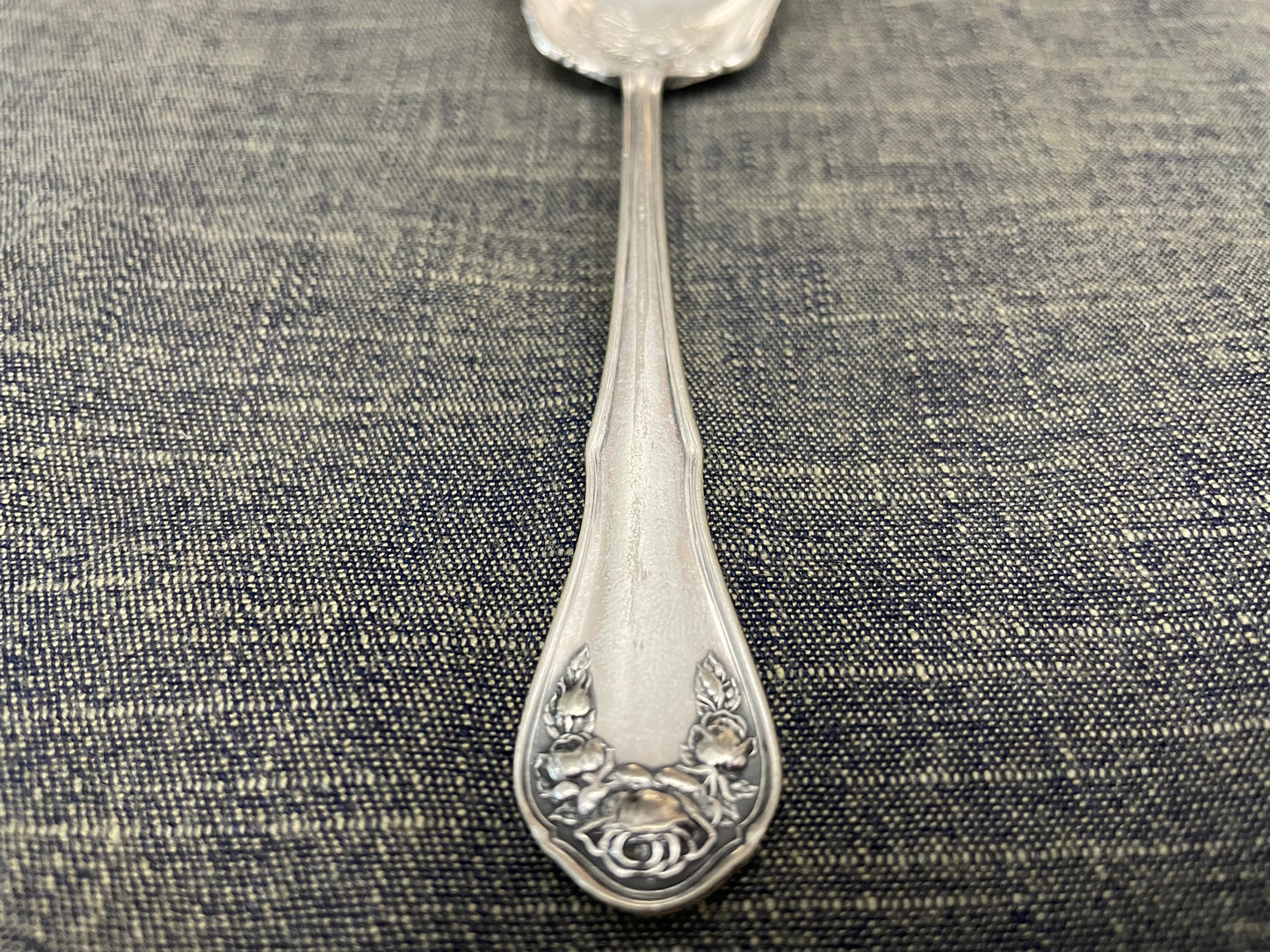 antique silver small serving spoon for serving or prop photography