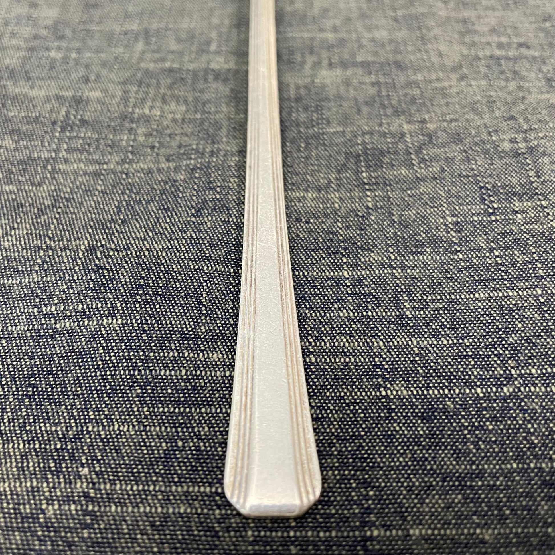 antique silver long handled teaspoon for serving jam or prop photography