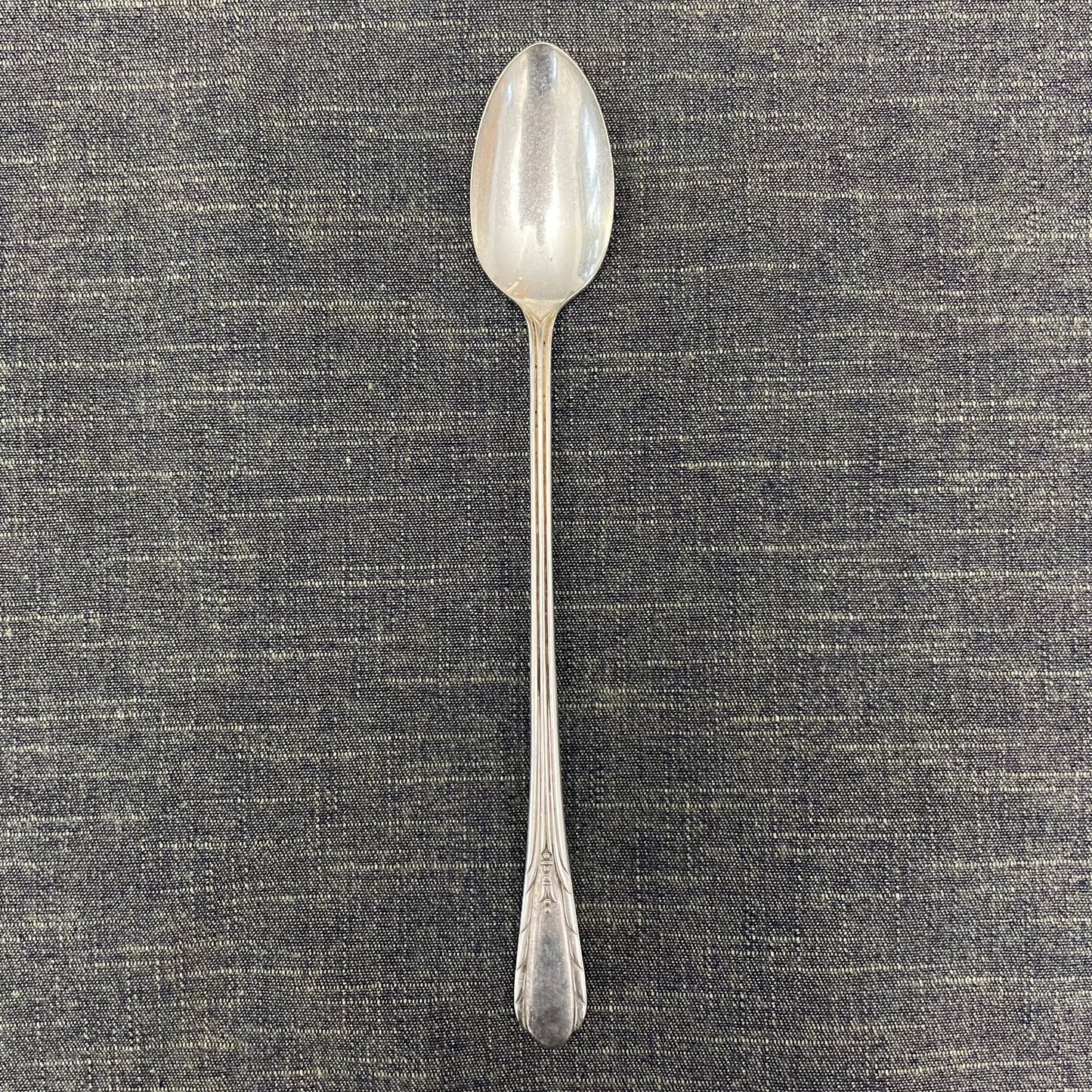 antique silver long handled teaspoon for serving jam or prop photography
