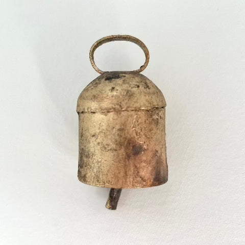 rounded top rustic tin bell with brass finish for an old world holiday decor