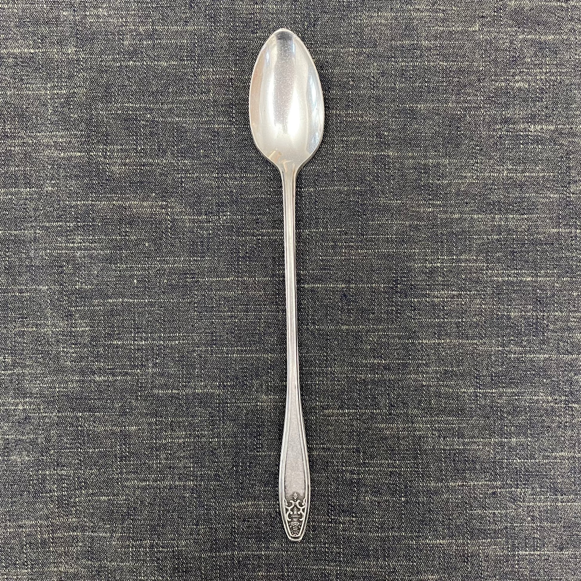 antique silver long handled teaspoon for serving jam or prop photography