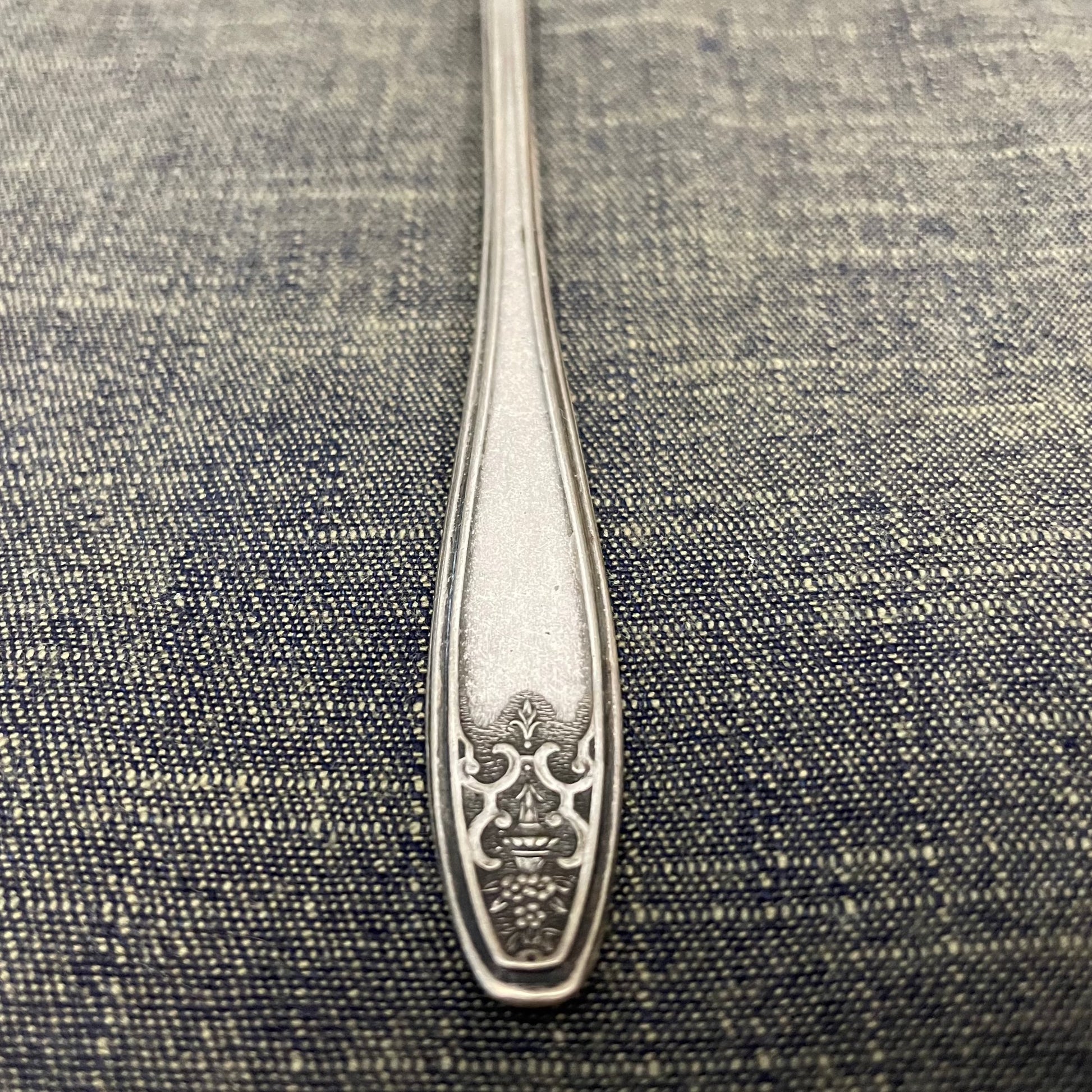 antique silver long handled teaspoon for serving jam or prop photography