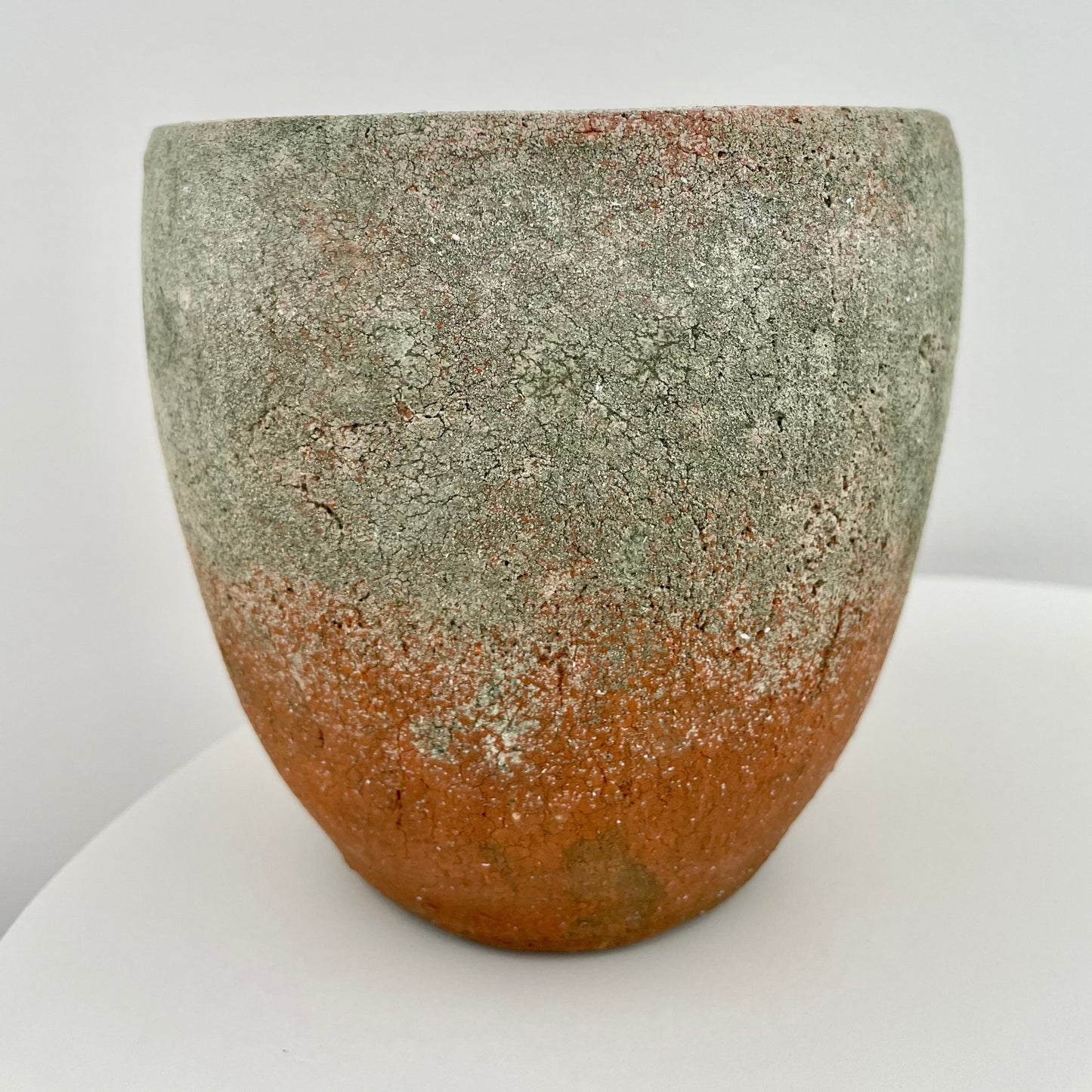 cement and ombre brick red round garden pot indoor planter