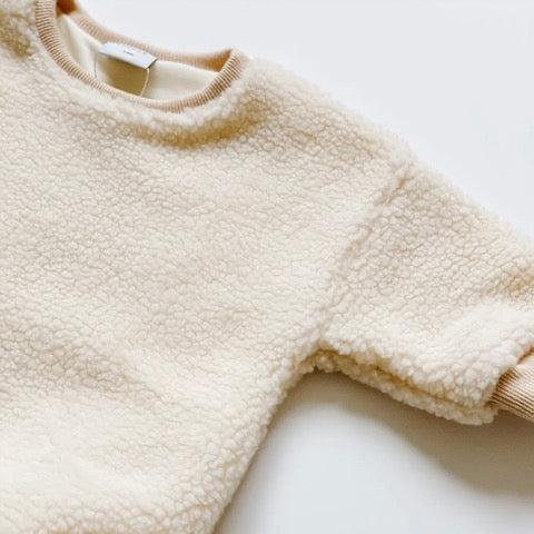 cream sherpa baby sweatshirt romper with ribbed collar and sleeves