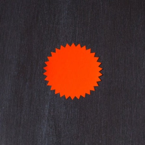 orange neon round starburst sticker labels