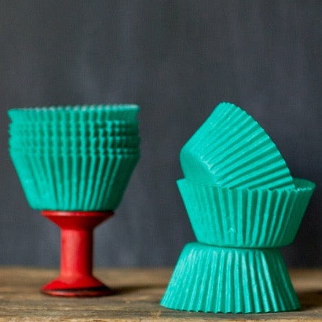 bright green solid paper cupcake liners for circus party supplies