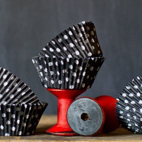 black and white polka dot paper cupcake liners for Halloween party supplies