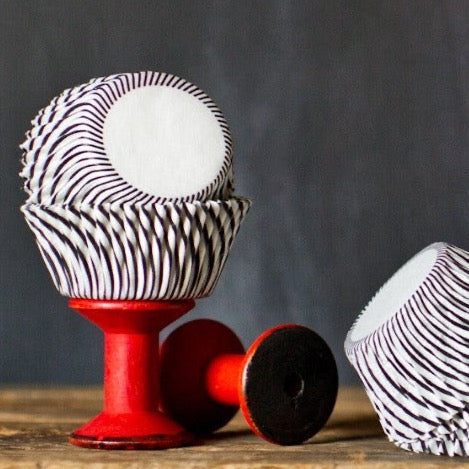 black and white striped paper cupcake liners for Halloween party supplies