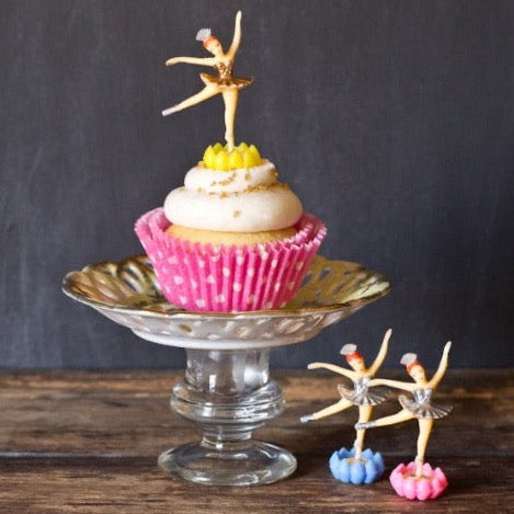 hot pink polka dot paper cupcake liners with ballerina cupcake toppers