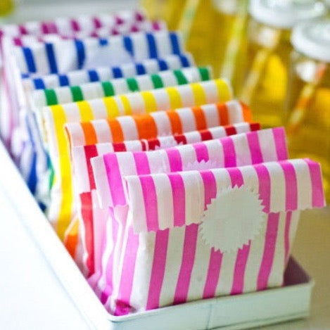 rainbow striped candy, treat, or gift bags for circus party