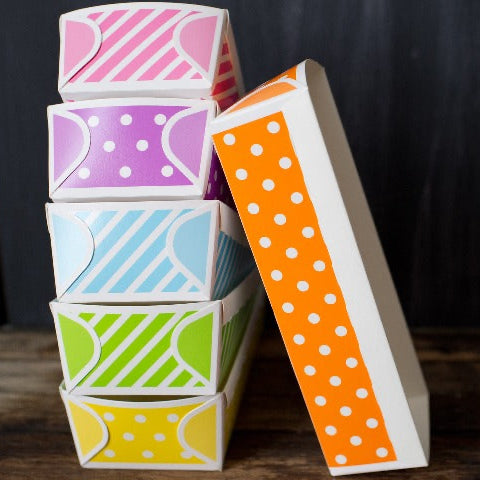 orange and white polka dot paper loaf baking pan