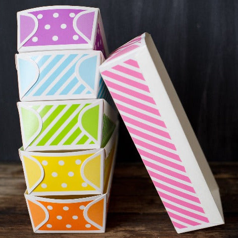 pink and white striped paper loaf baking pan