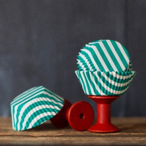 green and white striped paper cupcake liners for circus party supplies