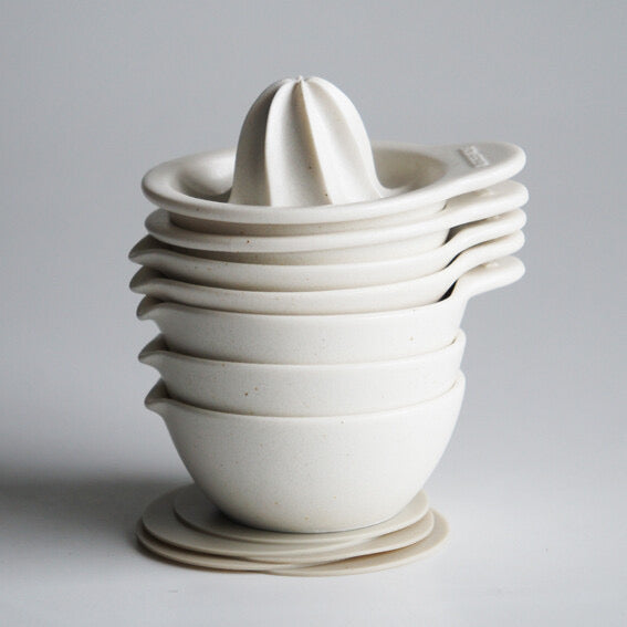 stack of handmade Japanese white ceramic mortar grater juicer bowl 