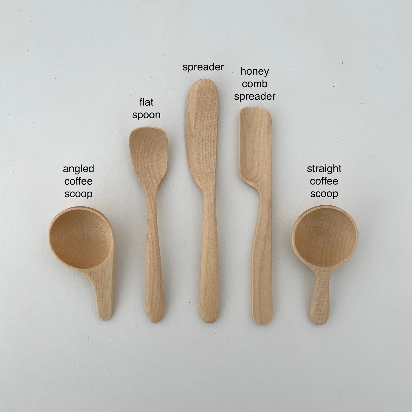 handmade maple wood straight handle coffee or tea scoops, honey and comb spreader, and flat spoon made in Indonesia