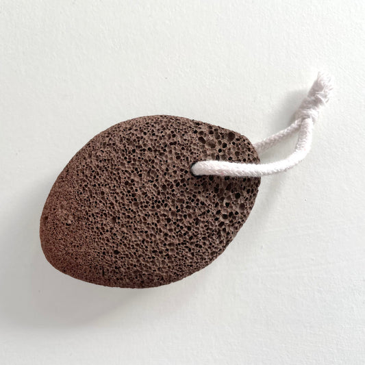 natural lava exfoliating pumice stone on a cotton rope
