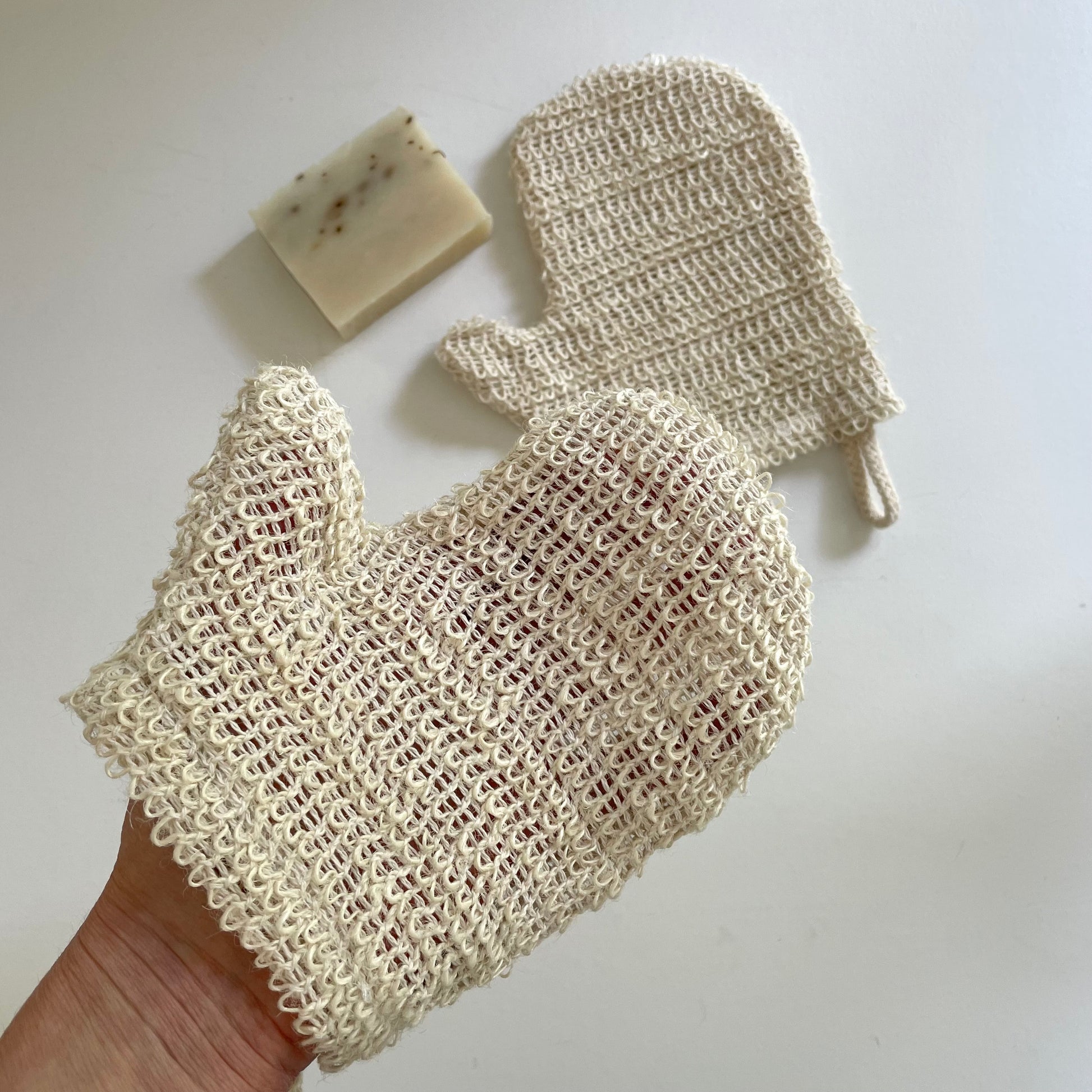 eco sustainable sisal exfoliating bath gloves with hanging loop