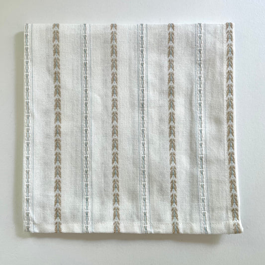 100 percent cotton cream 18x18 table dinner napkins with tan and blue pattern
