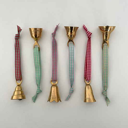 1 3/4" - 2" brass flared and tulip shaped collector bells made in India strung on check gingham taffeta ribbon made in Japan for Christmas holiday ornaments