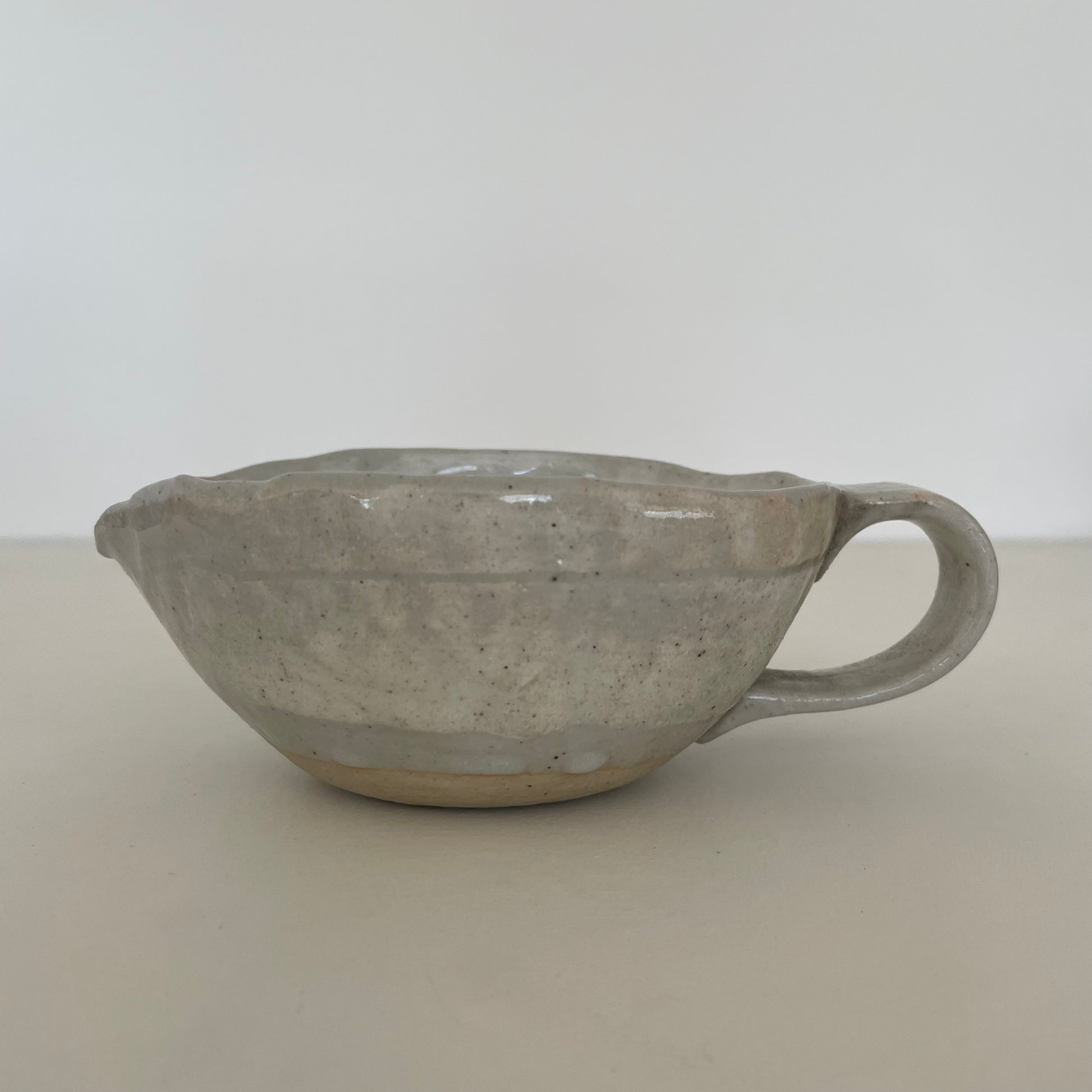 cream and grey gohonte handmade Japanese ceramic pottery small round pitcher, syrup pourer, gravy boat