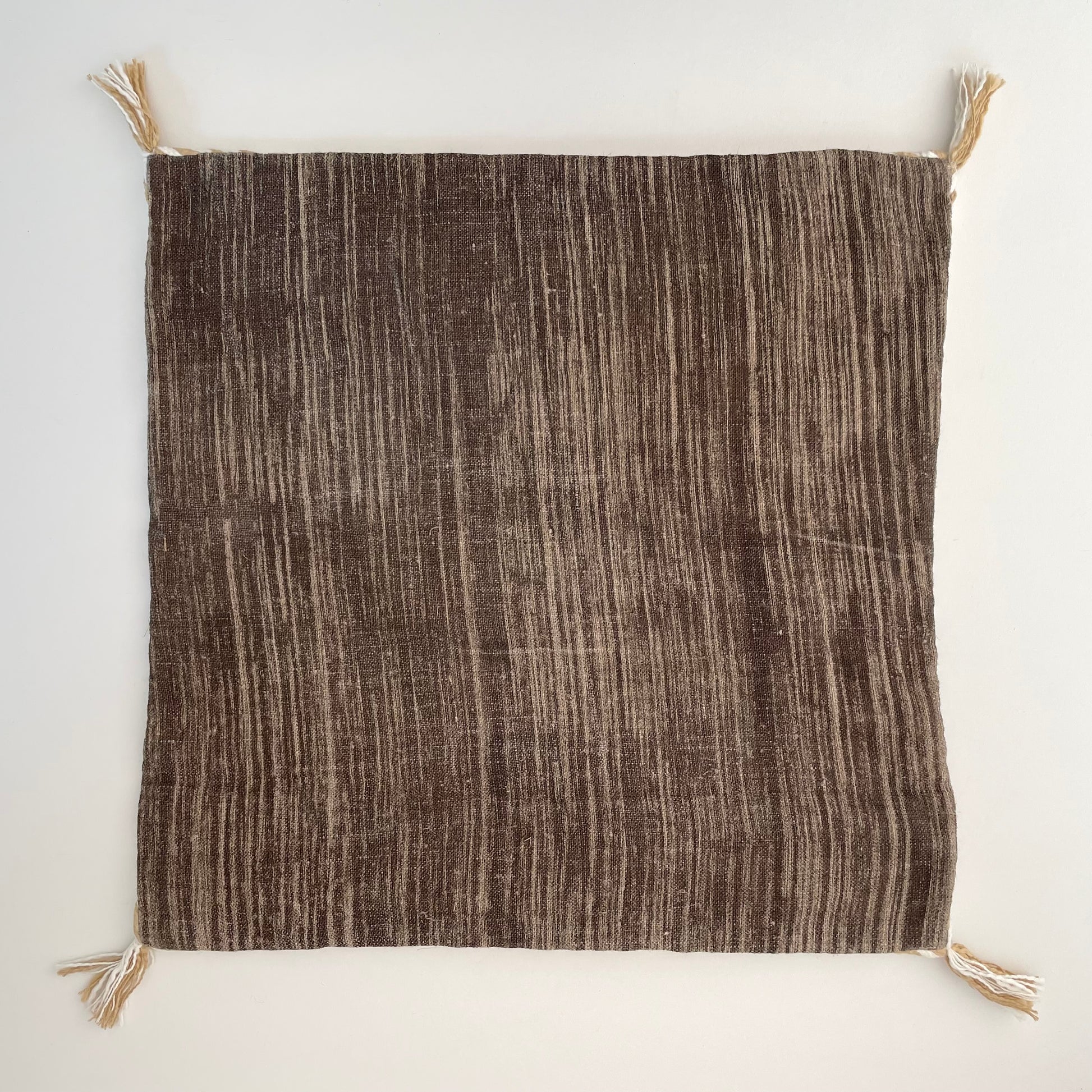 chocolate brown linen 18x18 square pillow cover with striped edging and tassels