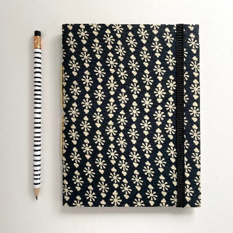 neutral black, cream, and blue fabric covered handmade unlined notebook journal