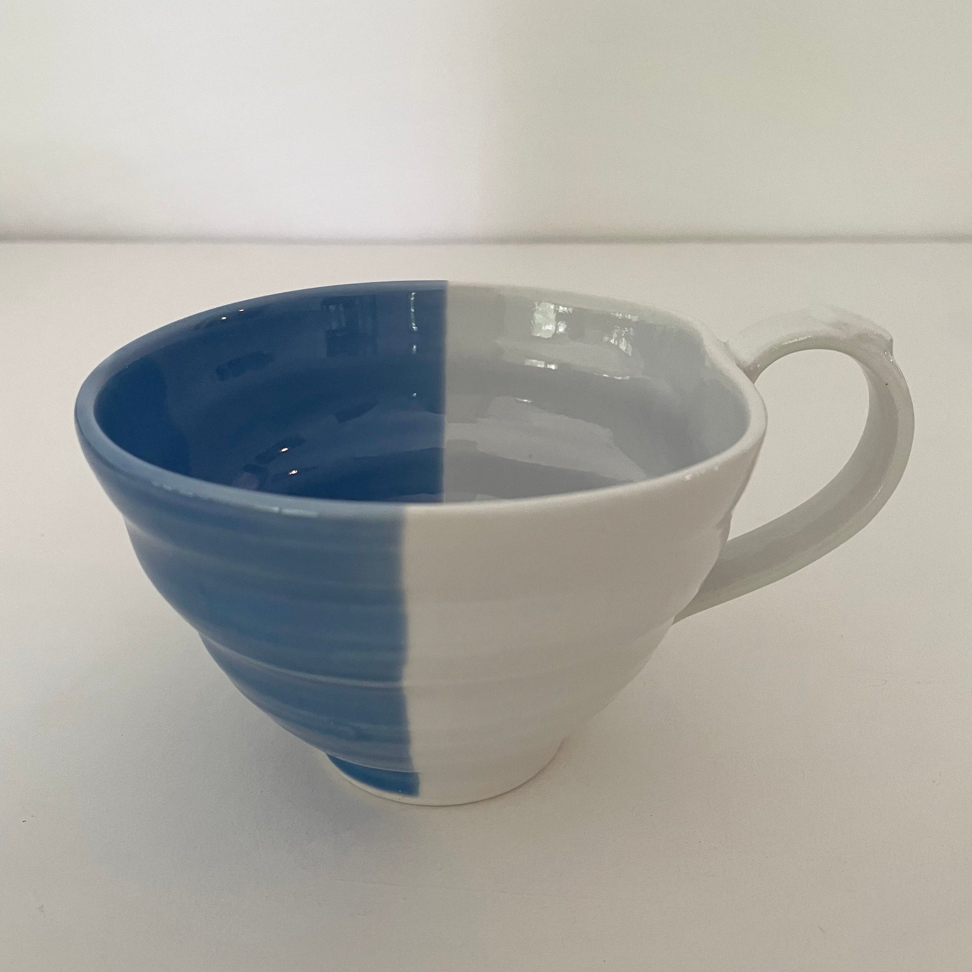 color-block blue and white mix and match artsy whimsical ceramic pottery Japanese coffee tea and soup mug