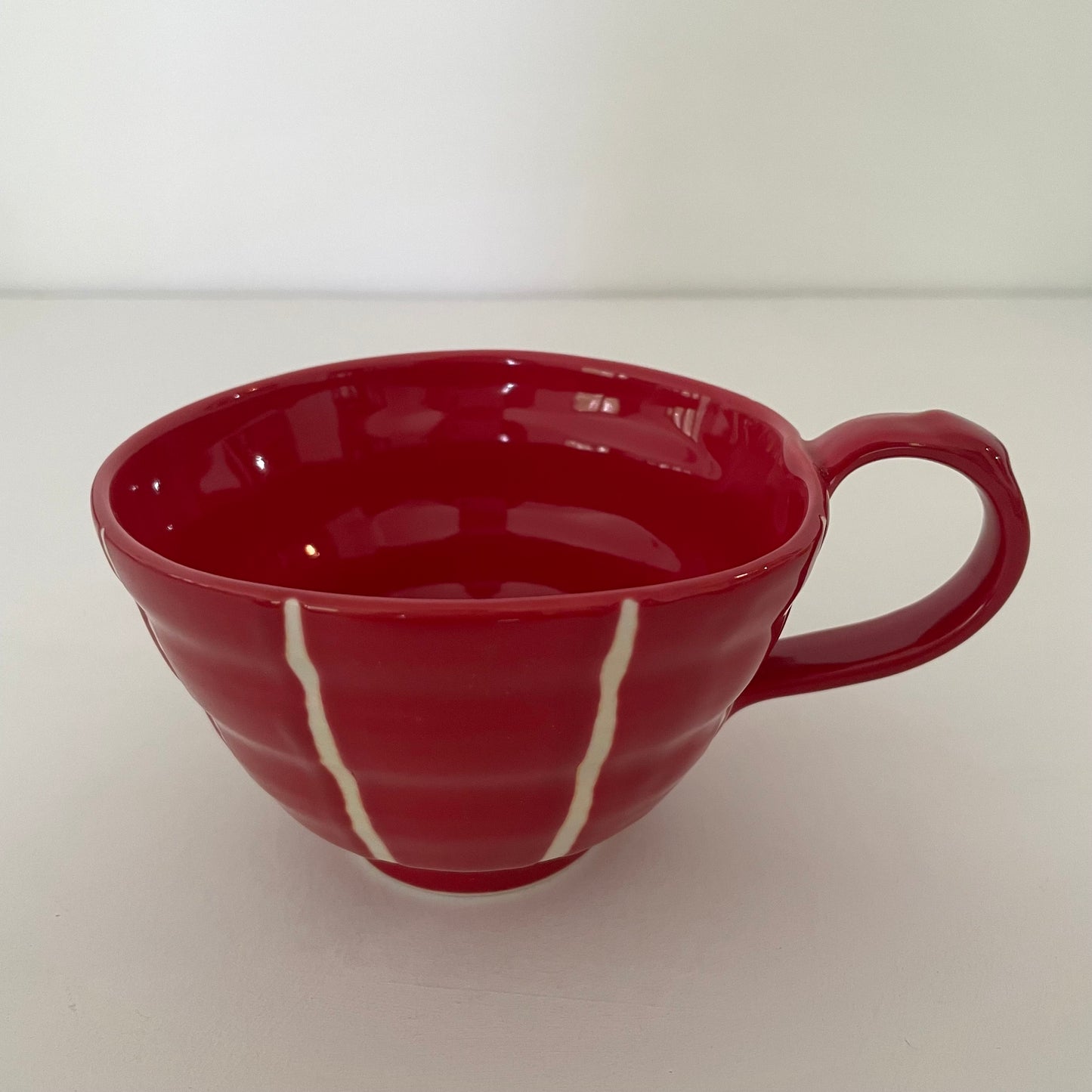 red and white vertical stripe mix and match artsy whimsical ceramic pottery Japanese coffee tea and soup mug