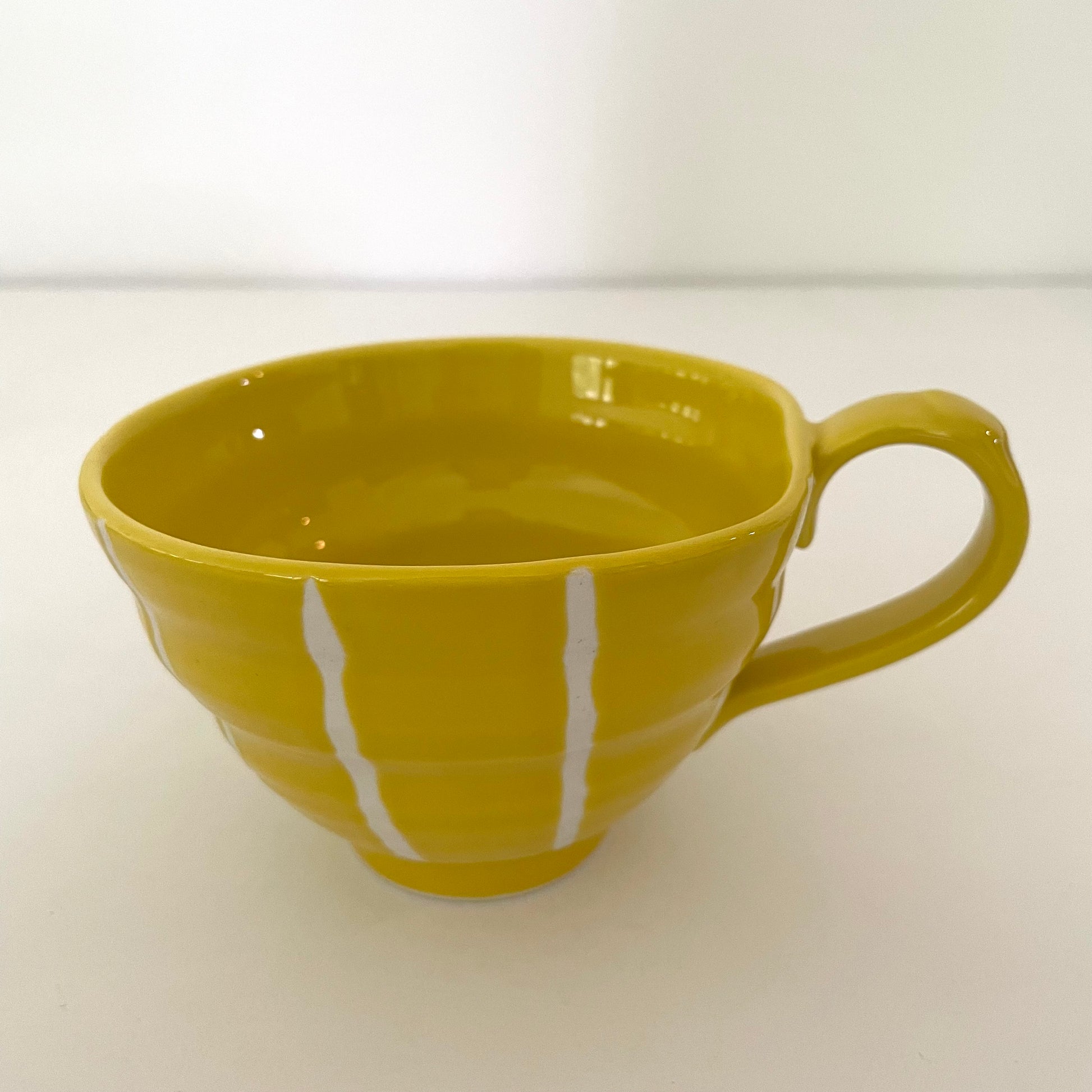 yellow and white vertical stripe mix and match artsy whimsical ceramic pottery Japanese coffee tea and soup mug