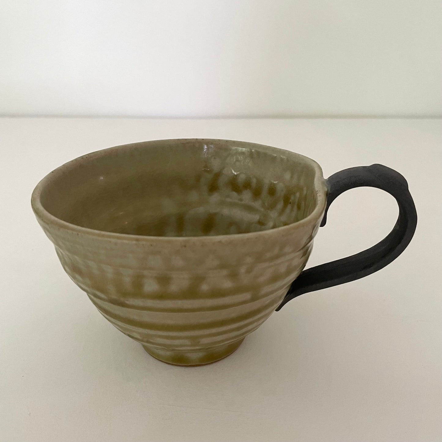 neutral tan with black handle mix and match artsy whimsical ceramic pottery Japanese coffee tea and soup mug