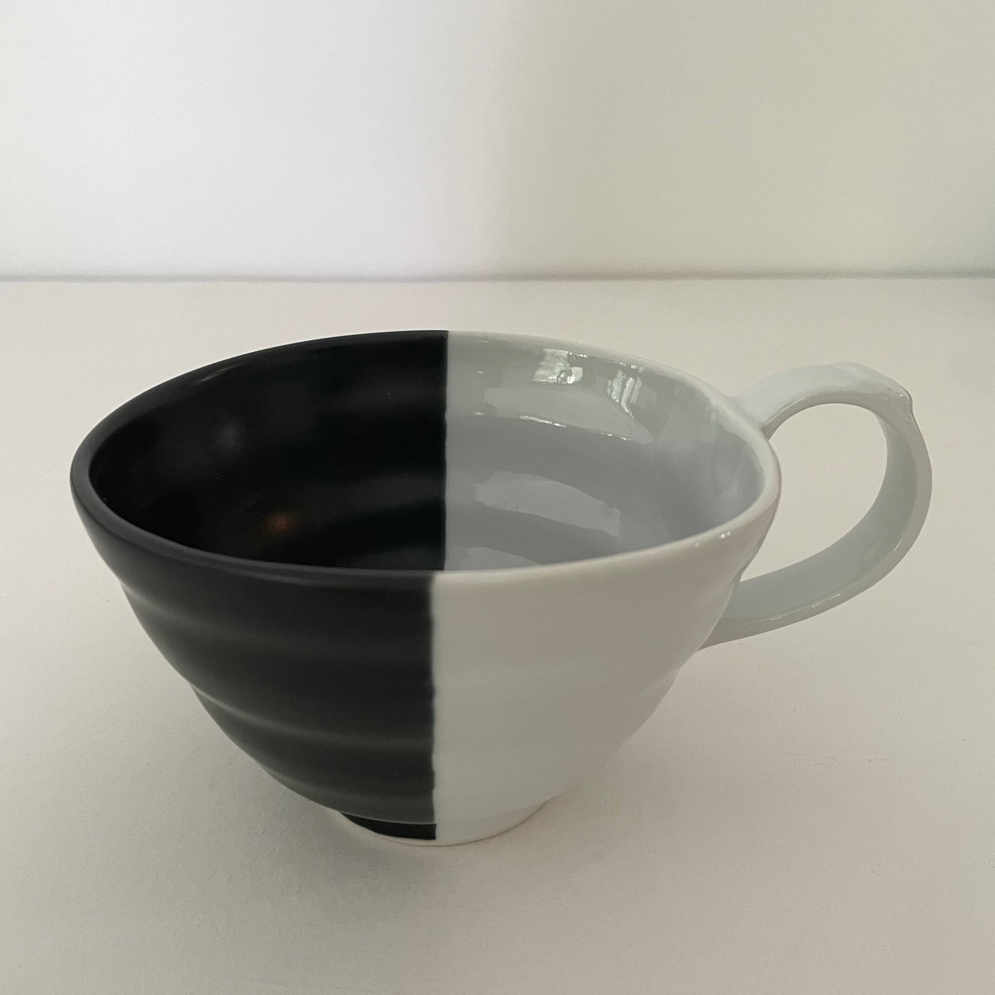 color-block black and white mix and match artsy whimsical ceramic pottery Japanese coffee tea and soup mug