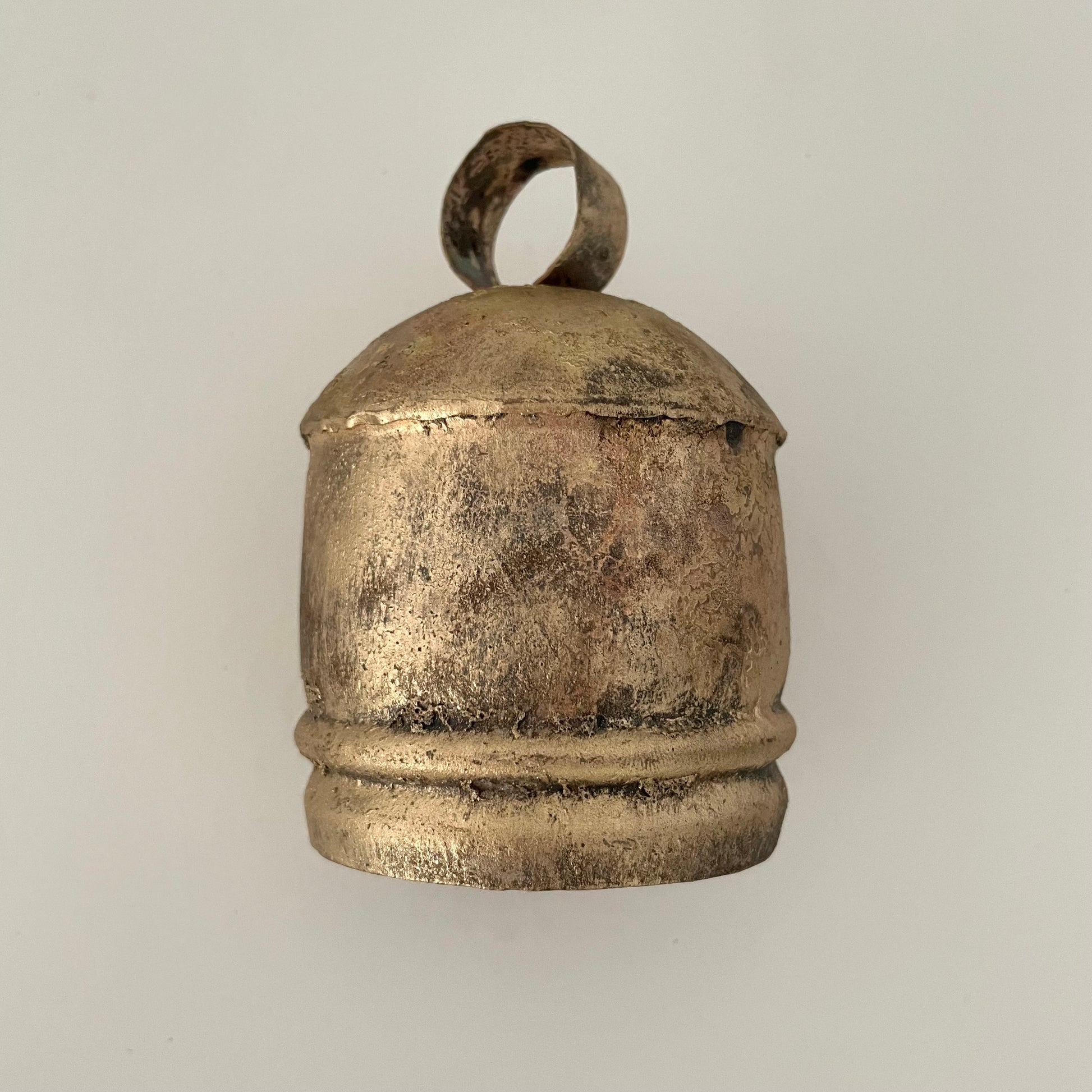 4" x 3" chunky tin bell with brass finish and wood striker made in India