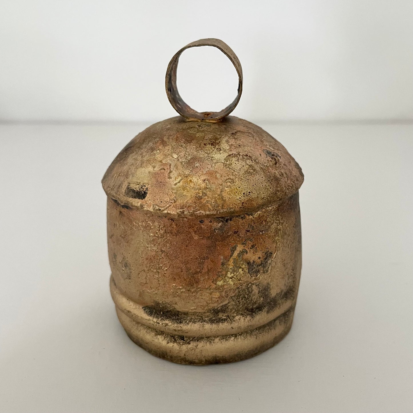 4" x 3" chunky tin bell with brass finish and wood striker made in India