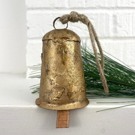 4 inch rustic tin flared cow bell with brass finish and wood striker for an old world holiday decor