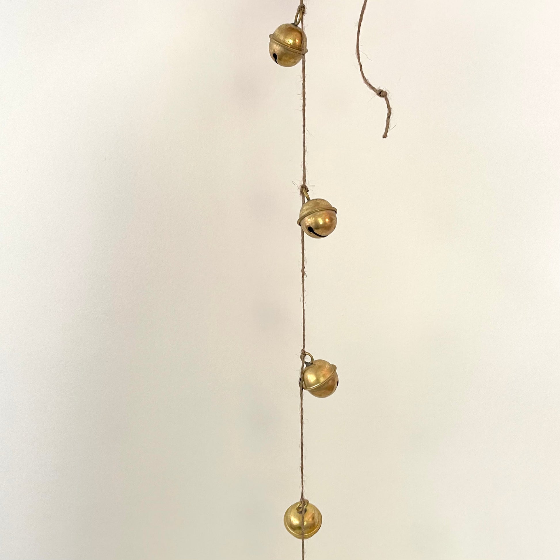 handmade brass sleigh bell garland on jute