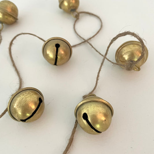 handmade brass sleigh bell garland on jute