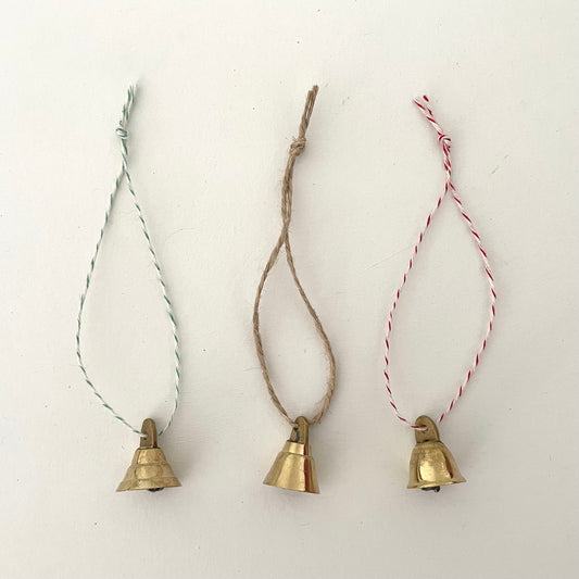 7/8" mini brass flared bell ornament on striped bakers twine or jute