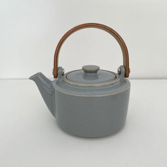 grayish blue handmade ceramic Japanese 1-2 cup teapot with bent wood handle and metal strainer