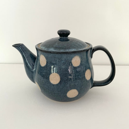 whimsical blue and white polka dot ceramic Japanese handmade teapot with metal strainer