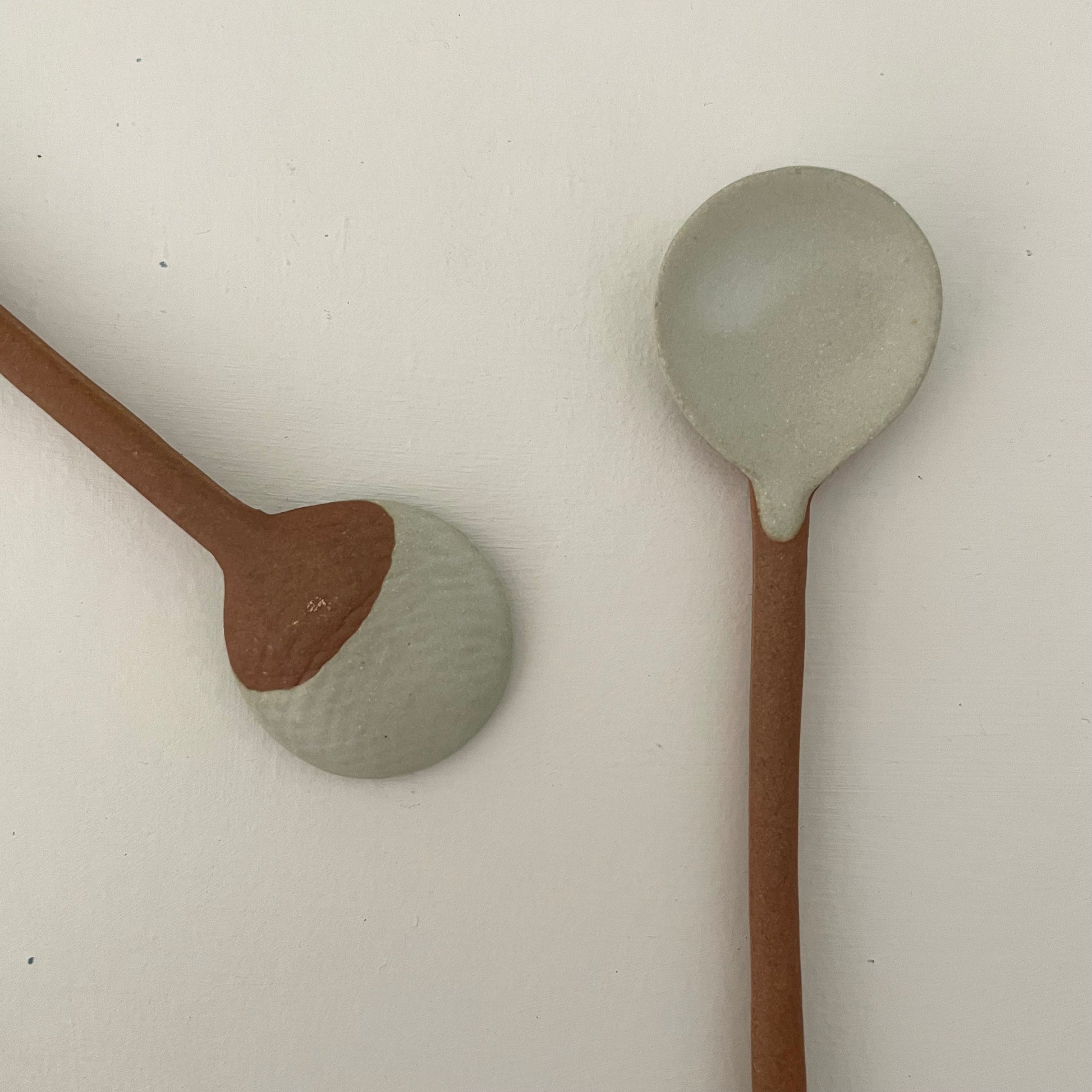 grey handmade Japanese coffee or tea pottery spoon