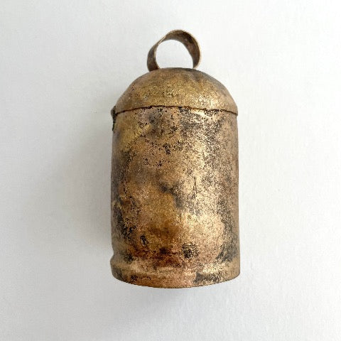 3 inch rustic tin bell with a brass finish and wood striker for an old world holiday decor