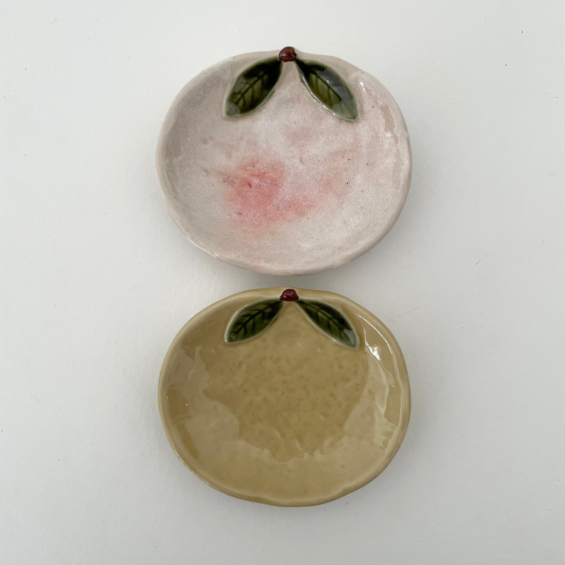 handmade Japanese ceramic mini pink and yellow yuzu shaped fruit dishes