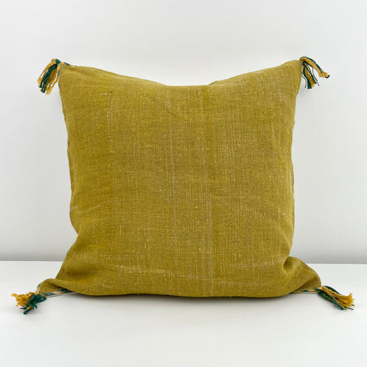 mustard yellow linen 18x18 square pillow cover with striped edging and tassels