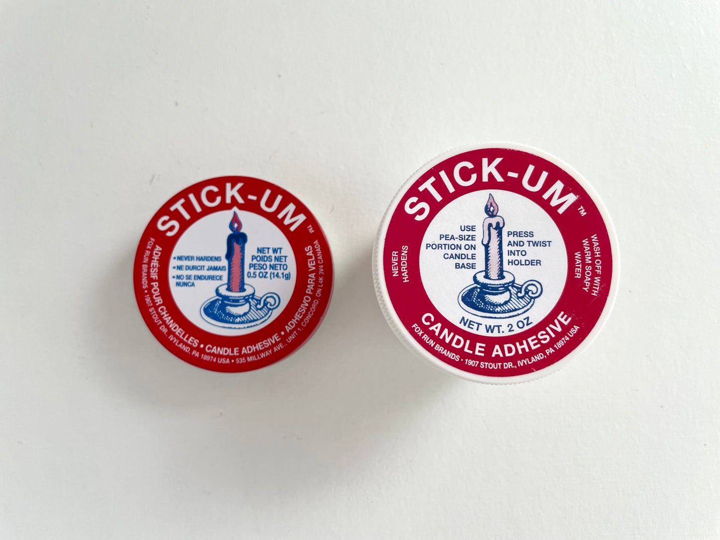 stick-um candle wax adhesive to keep tapers upright in the stand