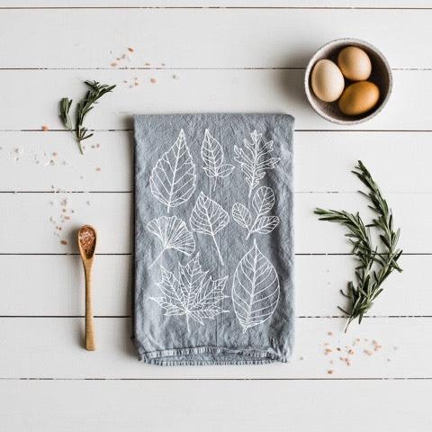 grey and white 100 percent organic cotton hand printed autumn leaves dishtowel for a farmhouse kitchen